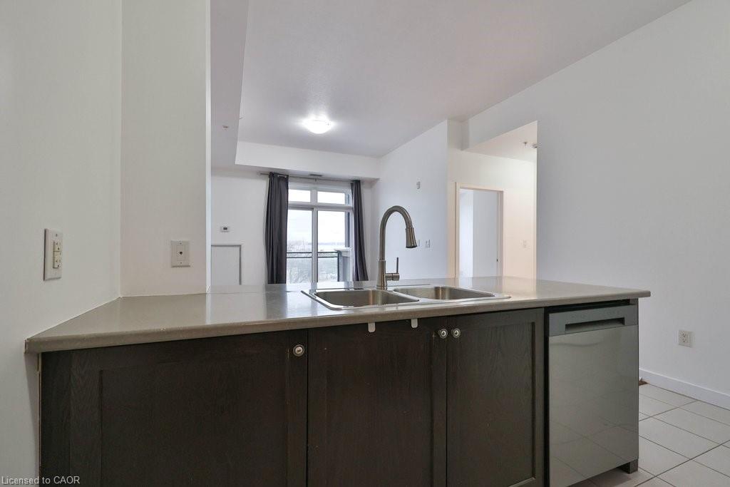 417-5020 Corporate Drive, Burlington, ON - Indoor Photo Showing Kitchen With Double Sink