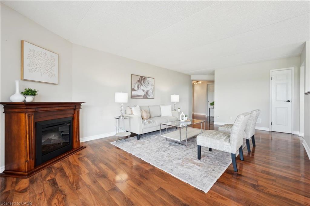 501-22 Marilyn Drive, Guelph, ON - Indoor Photo Showing Living Room With Fireplace