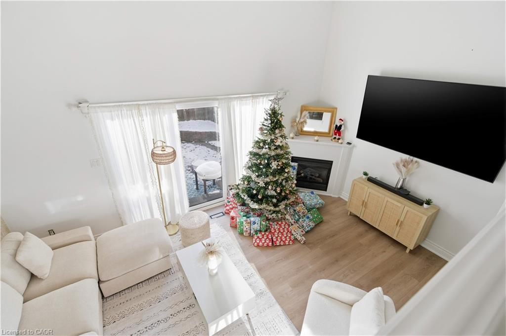 65-11 Harrisford Street, Hamilton, ON - Indoor Photo Showing Living Room With Fireplace