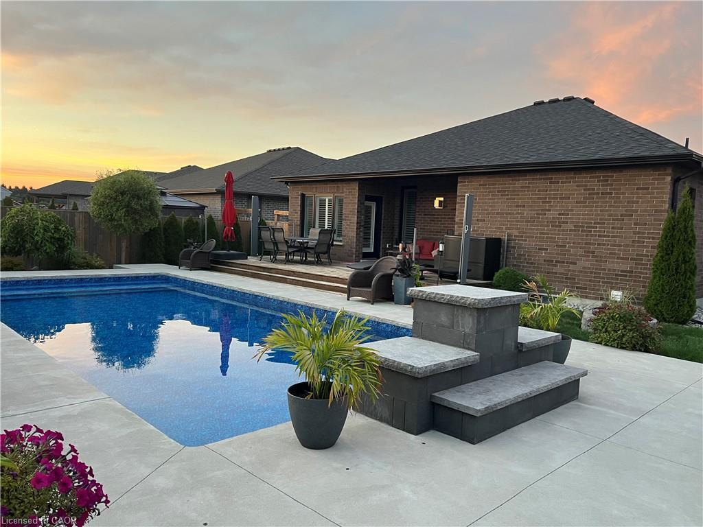 208 Oak Street, Simcoe, ON - Outdoor With In Ground Pool With Deck Patio Veranda