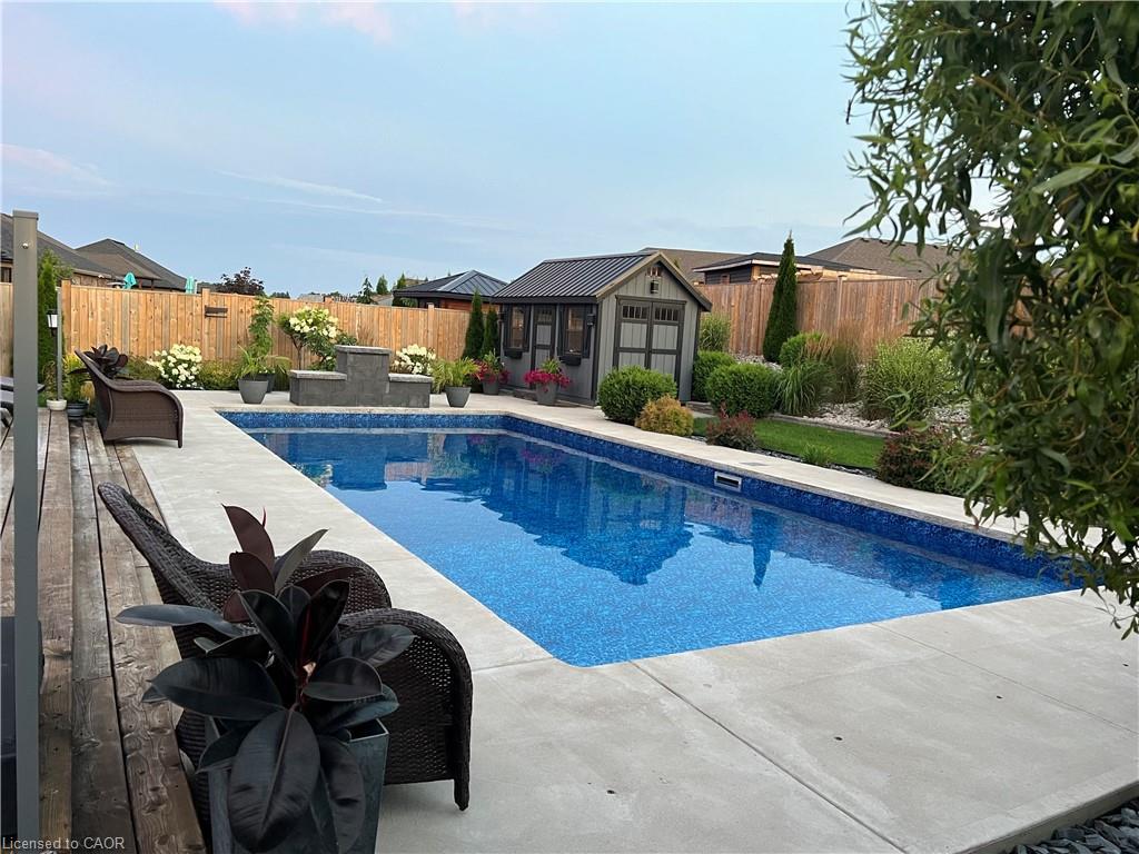208 Oak Street, Simcoe, ON - Outdoor With In Ground Pool With Backyard