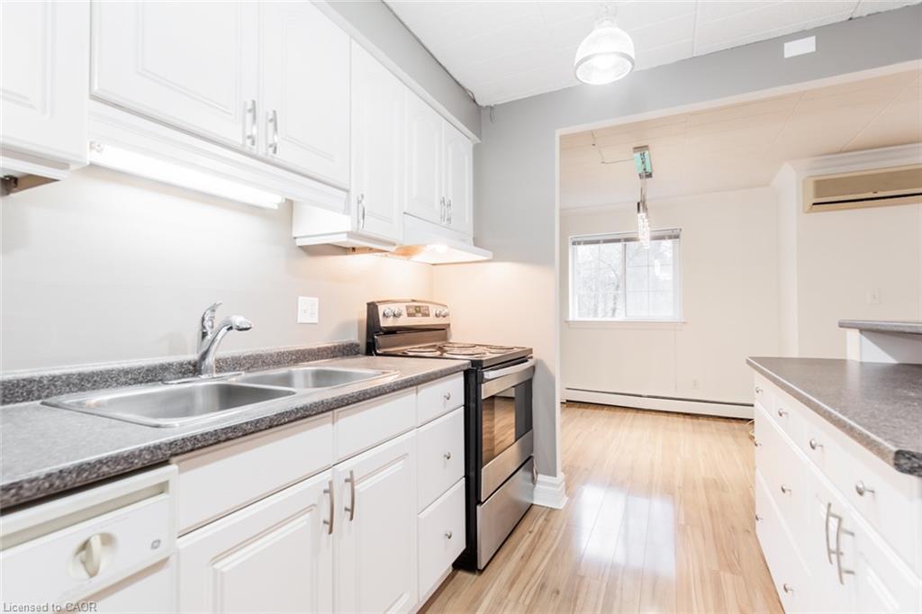 110-20 John Street, Grimsby, ON - Indoor Photo Showing Kitchen With Double Sink