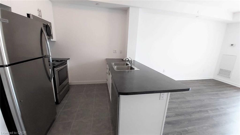 225-101 Shoreview Place, Stoney Creek, ON - Indoor Photo Showing Kitchen With Double Sink
