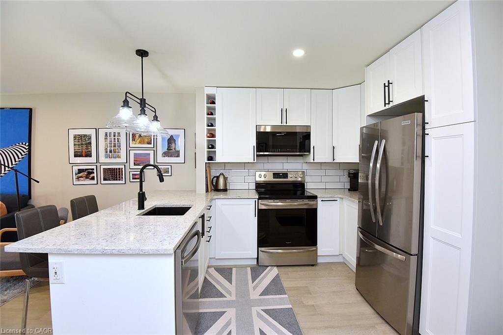 103-2035 Appleby Line, Burlington, ON - Indoor Photo Showing Kitchen With Stainless Steel Kitchen With Upgraded Kitchen