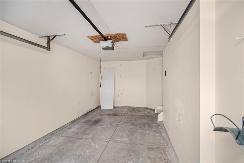 23-222 Fall Fair Way, Binbrook, ON - Indoor Photo Showing Garage