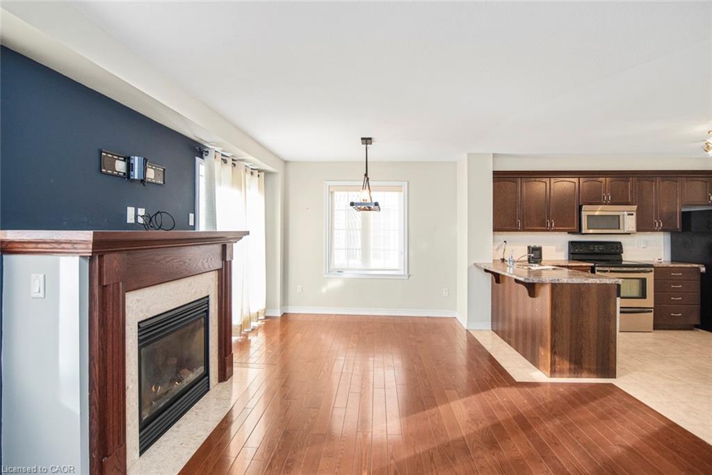 23-222 Fall Fair Way, Binbrook, ON - Indoor With Fireplace