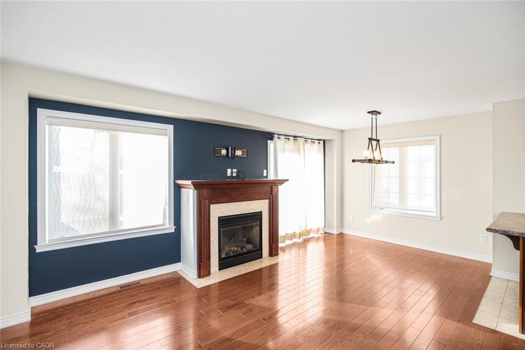 23-222 Fall Fair Way, Binbrook, ON - Indoor Photo Showing Living Room With Fireplace