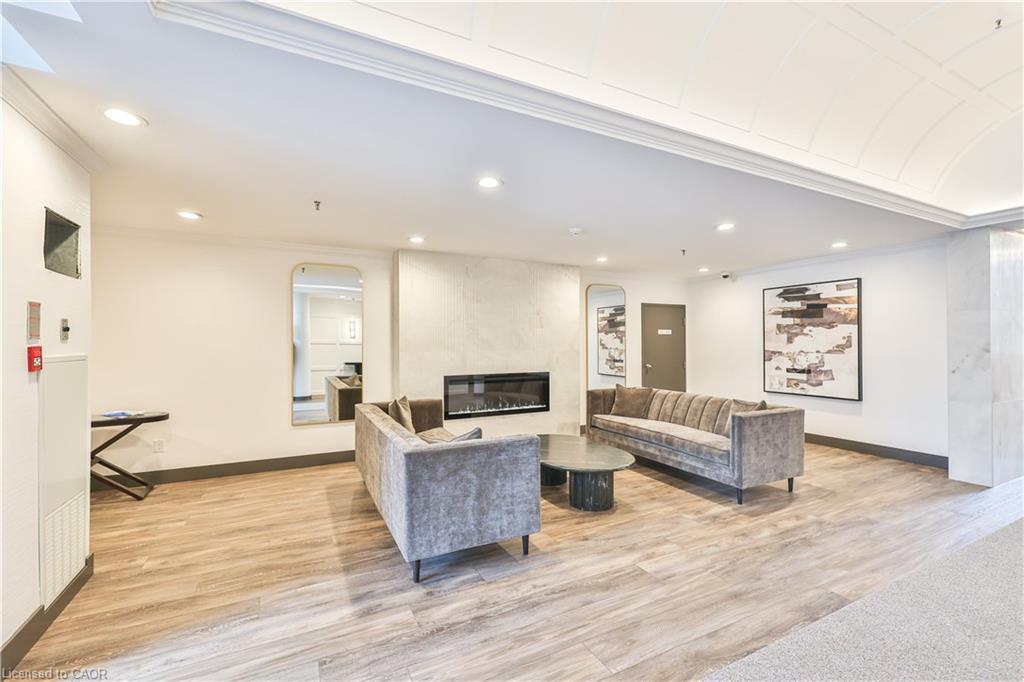404-185 Robinson Street, Oakville, ON - Indoor With Fireplace