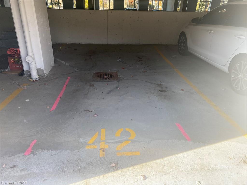 302-155 Water Street S, Cambridge, ON - Indoor Photo Showing Garage