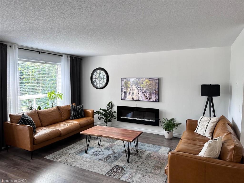 179 Dalecroft Place, Waterloo, ON - Indoor Photo Showing Living Room With Fireplace