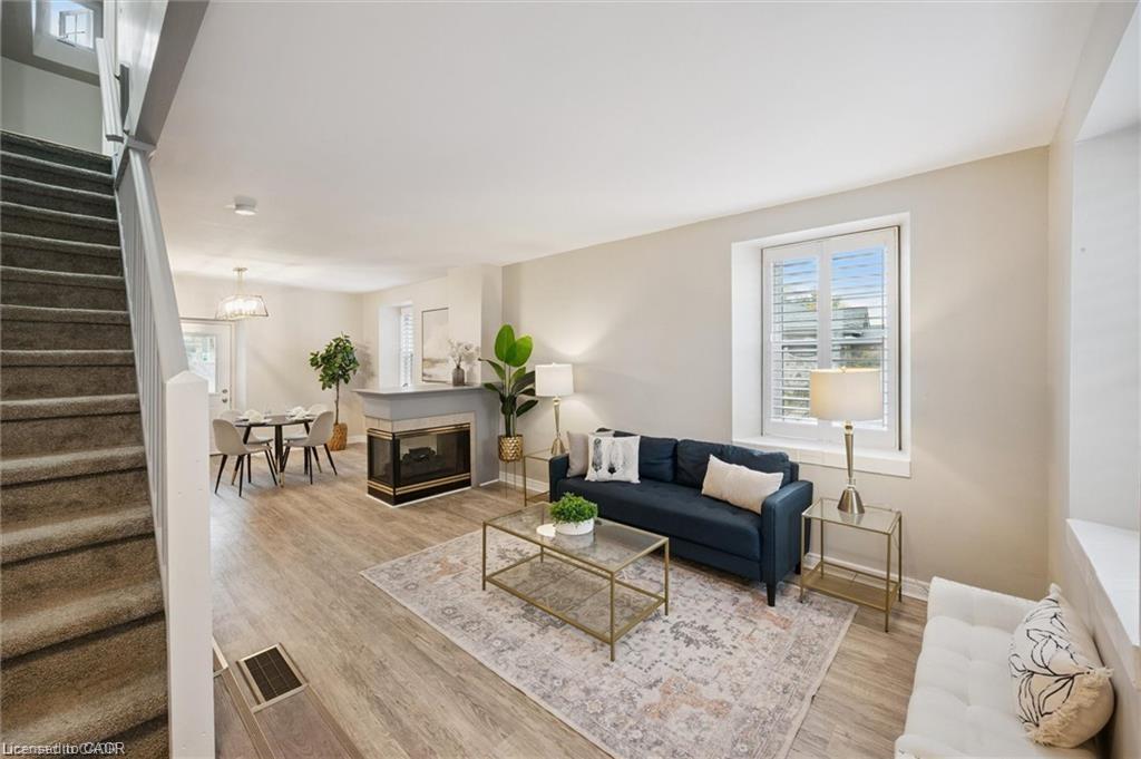 16-18 St Andrews Street, Cambridge, ON - Indoor Photo Showing Living Room With Fireplace