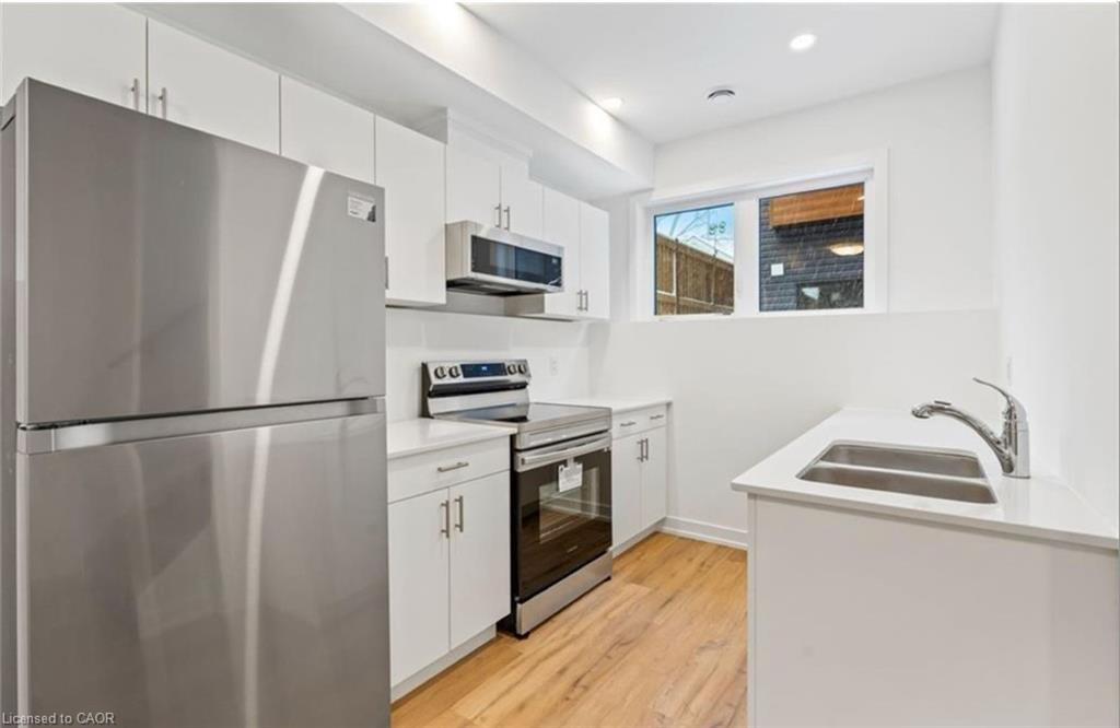 314-781 Clare Avenue, Welland, ON - Indoor Photo Showing Kitchen With Double Sink