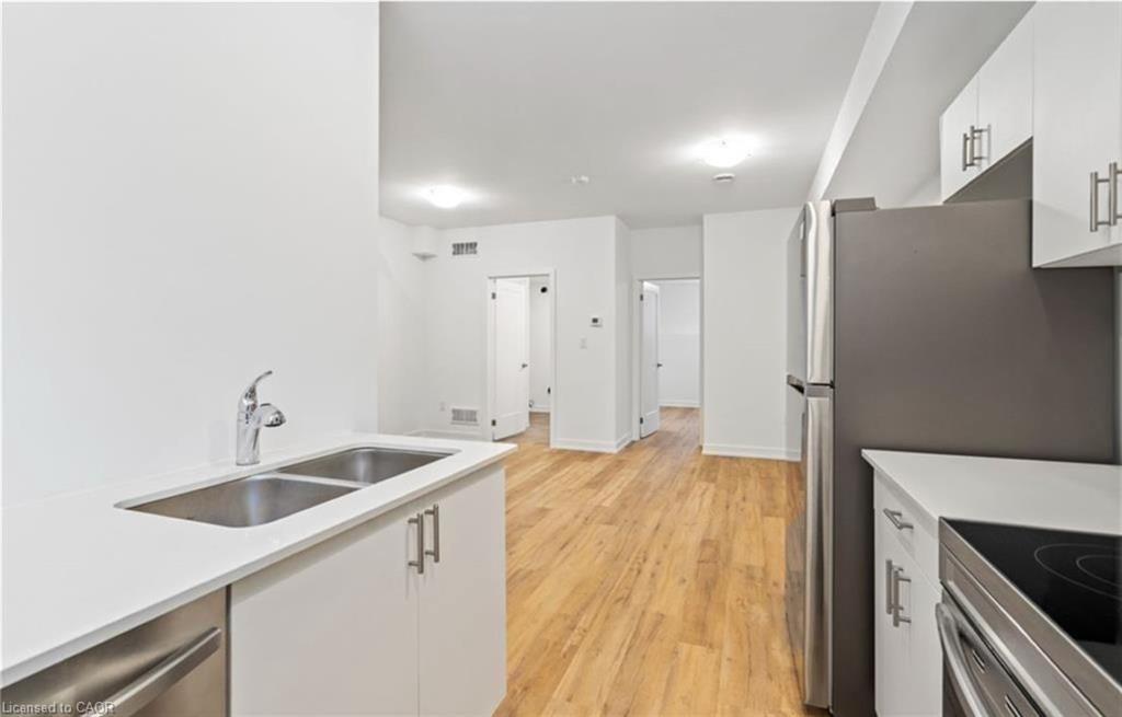 314-781 Clare Avenue, Welland, ON - Indoor Photo Showing Kitchen With Double Sink