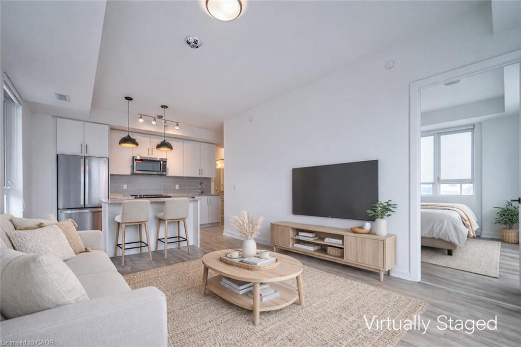 403-345 Wheat Boom Drive, Oakville, ON - Indoor Photo Showing Living Room