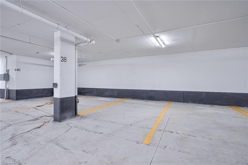 403-345 Wheat Boom Drive, Oakville, ON - Indoor Photo Showing Garage