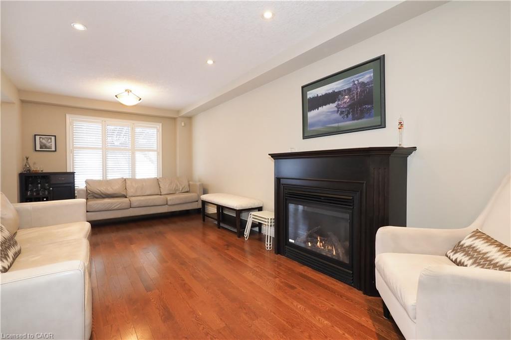 33 Huck Crescent, Kitchener, ON - Indoor Photo Showing Living Room With Fireplace