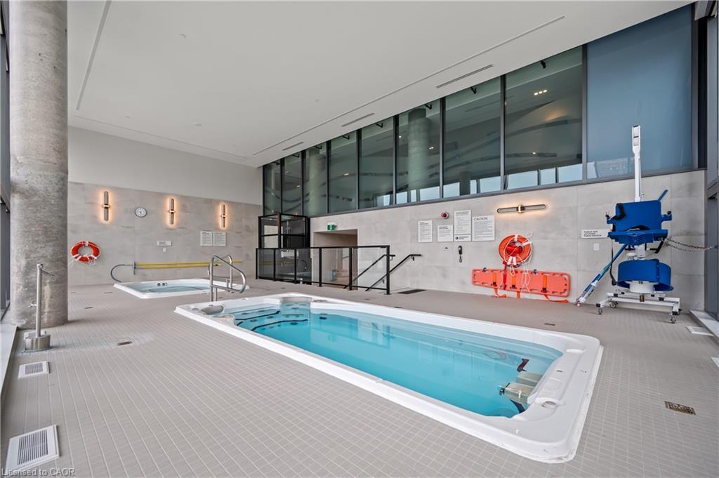 907-25 Wellington Street S, Kitchener, ON - Indoor Photo Showing Other Room With In Ground Pool