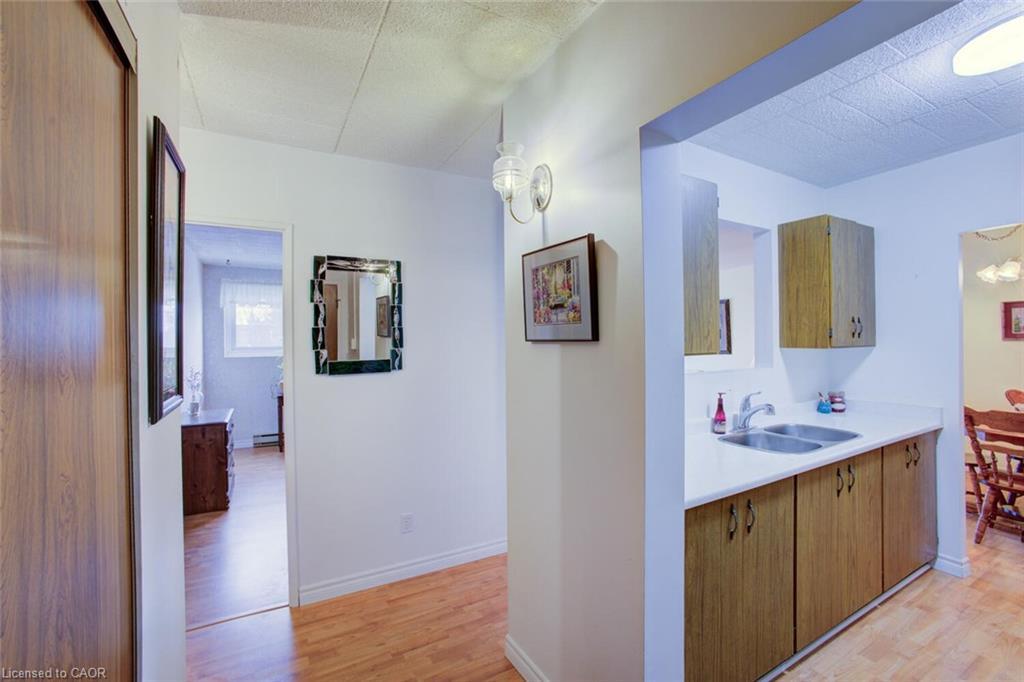 312-80 Breckenridge Drive, Kitchener, ON - Indoor Photo Showing Kitchen With Double Sink