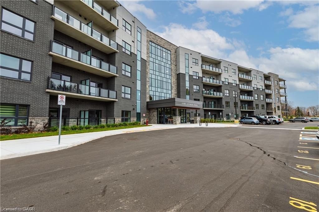 309-1100 Lackner Place, Kitchener, ON - Outdoor With Balcony With Facade
