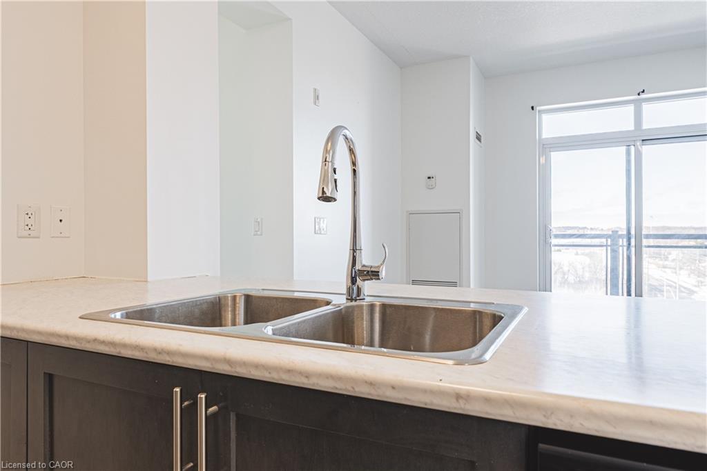 706-2486 Old Bronte Road, Oakville, ON - Indoor Photo Showing Kitchen With Double Sink