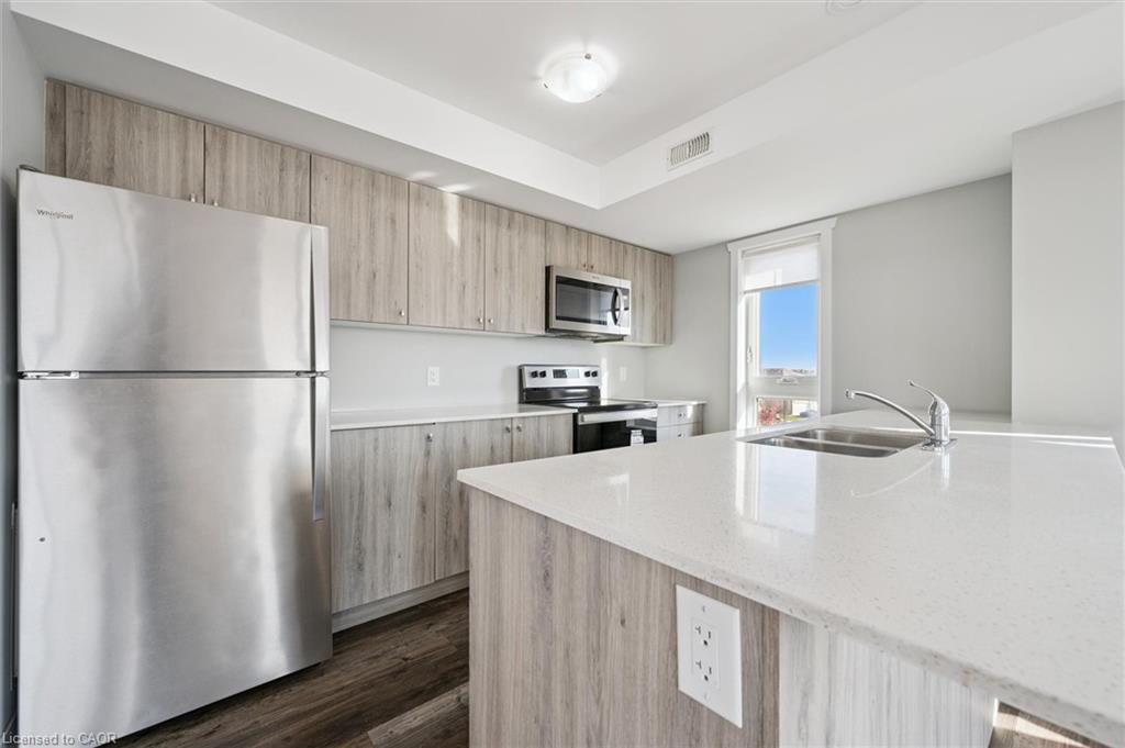 B16-1331 Countrystone Drive, Kitchener, ON - Indoor Photo Showing Kitchen With Stainless Steel Kitchen With Double Sink