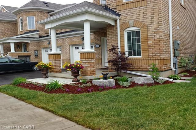 368 Cavanagh Lane, Milton, ON - Outdoor With Facade