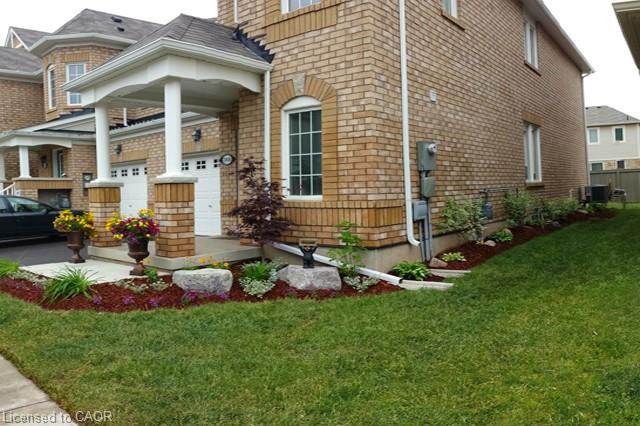 368 Cavanagh Lane, Milton, ON - Outdoor With Facade