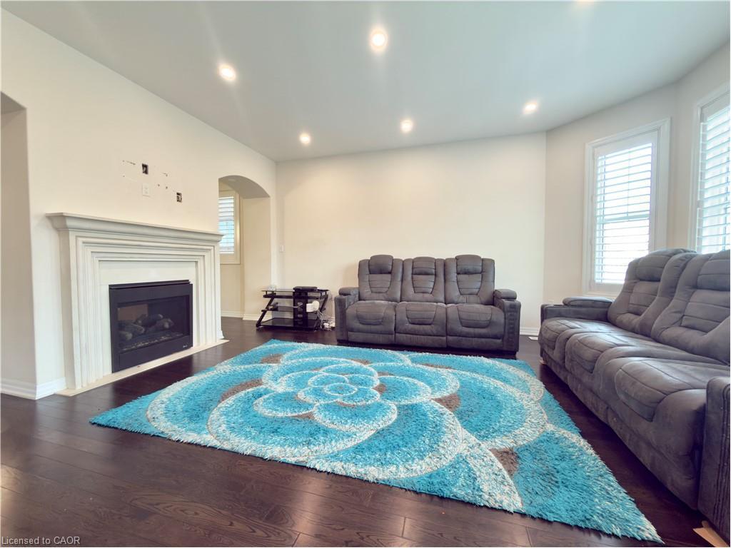 3147 Carding Mill Trail, Oakville, ON - Indoor Photo Showing Living Room With Fireplace