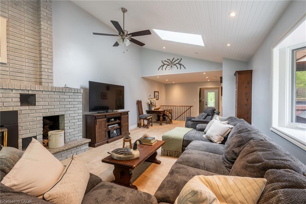 7575 Milburough Line, Milton, ON - Indoor Photo Showing Living Room With Fireplace
