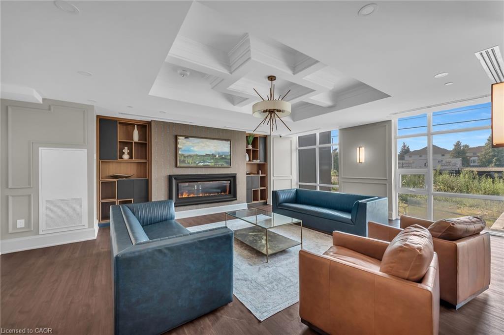 801-470 Dundas Street E, Waterdown, ON - Indoor Photo Showing Living Room With Fireplace