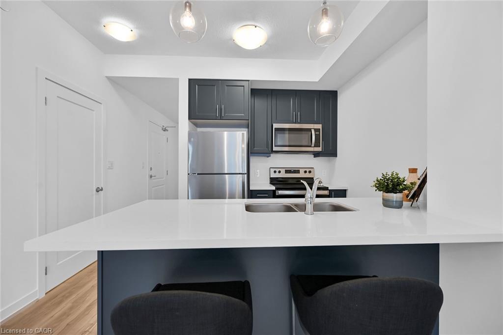 801-470 Dundas Street E, Waterdown, ON - Indoor Photo Showing Kitchen With Double Sink With Upgraded Kitchen
