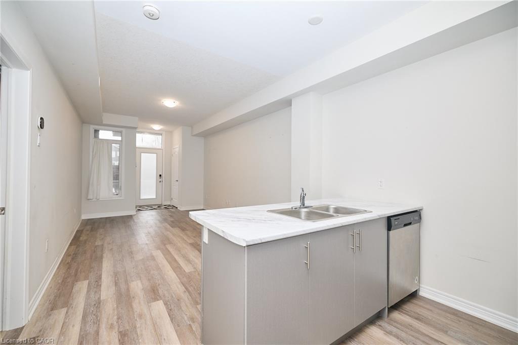 7-5016 Serena Drive, Beamsville, ON - Indoor Photo Showing Kitchen With Double Sink