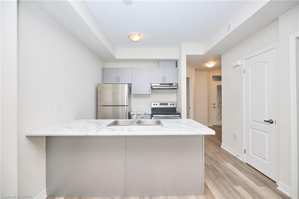 7-5016 Serena Drive, Beamsville, ON - Indoor Photo Showing Kitchen With Double Sink