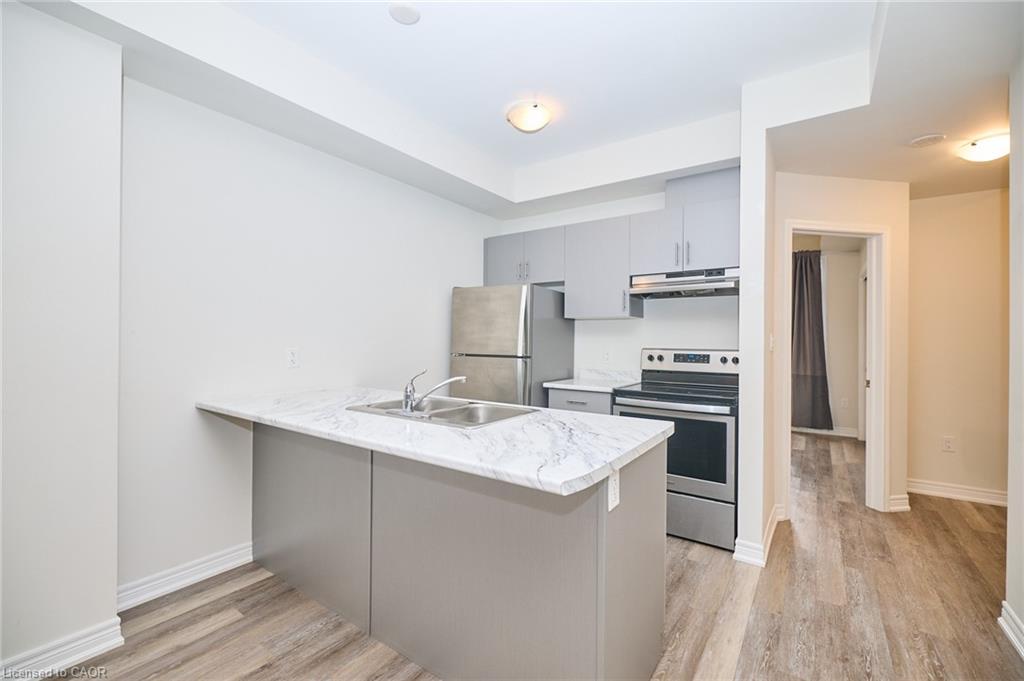 7-5016 Serena Drive, Beamsville, ON - Indoor Photo Showing Kitchen With Stainless Steel Kitchen With Double Sink