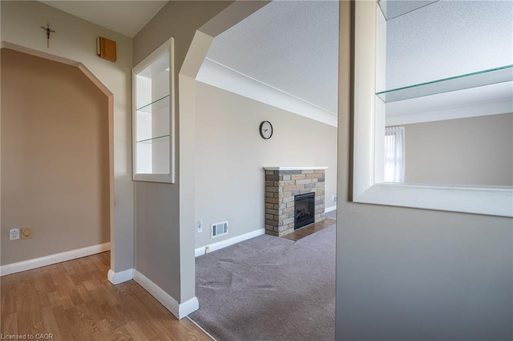 173 West 23Rd Street, Hamilton, ON - Indoor Photo Showing Other Room With Fireplace