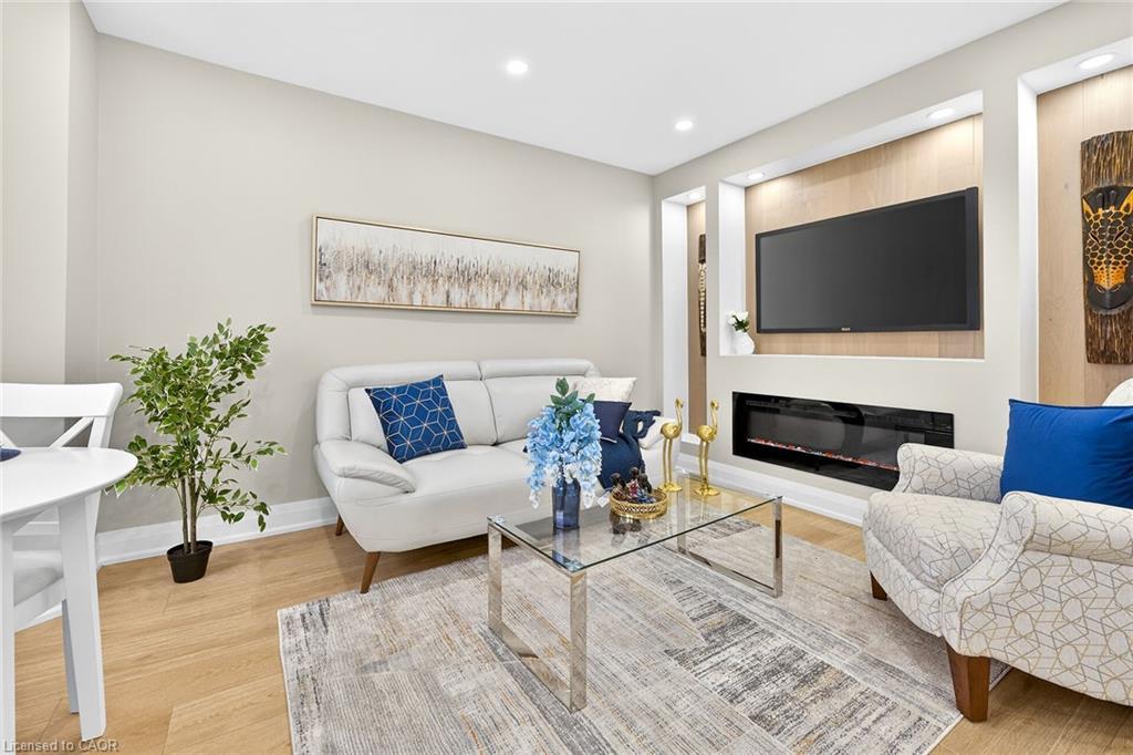 150 Brucedale Avenue E, Hamilton, ON - Indoor Photo Showing Living Room With Fireplace