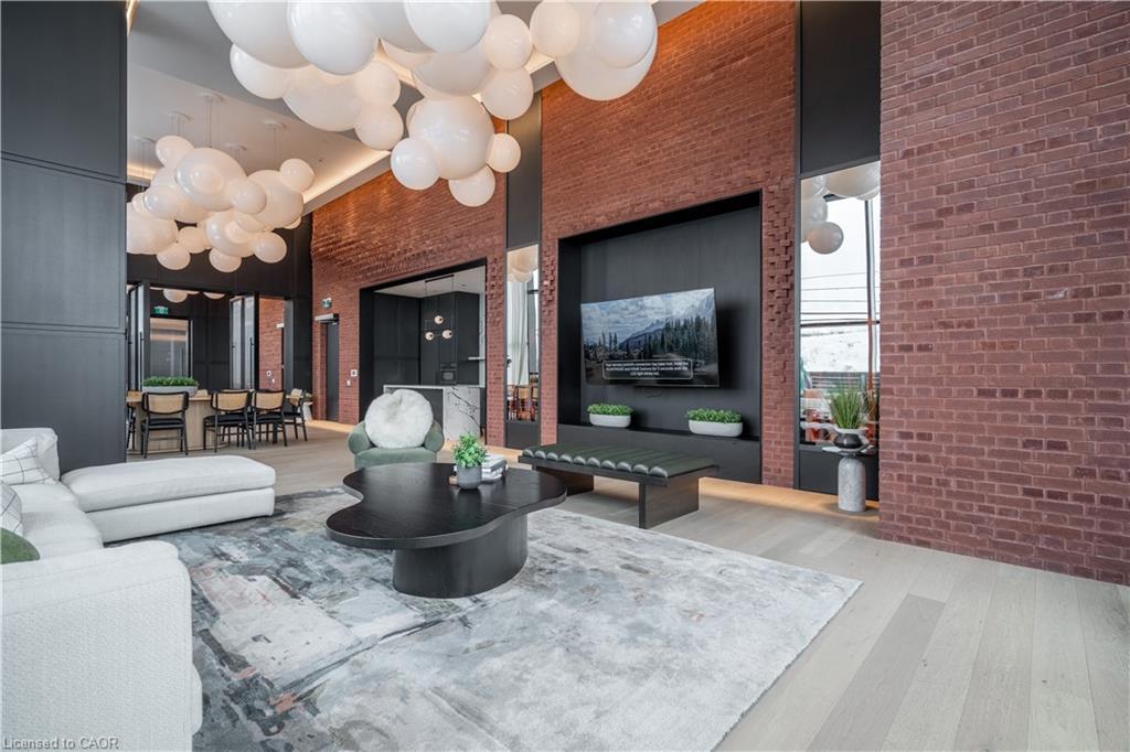 411-3200 William Coltson Avenue, Oakville, ON - Indoor Photo Showing Living Room With Fireplace