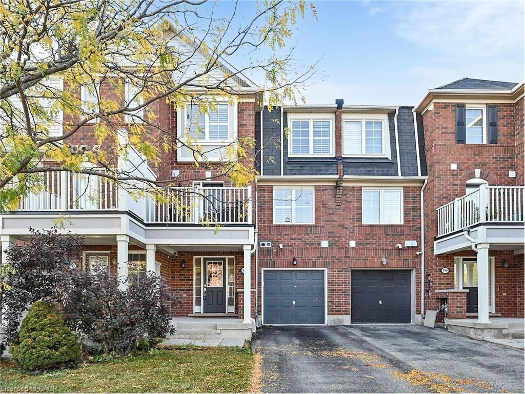 597 Speyer Circle, Milton, ON - Outdoor With Facade