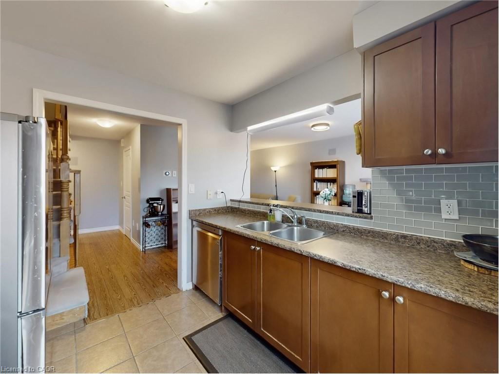 597 Speyer Circle, Milton, ON - Indoor Photo Showing Kitchen With Double Sink