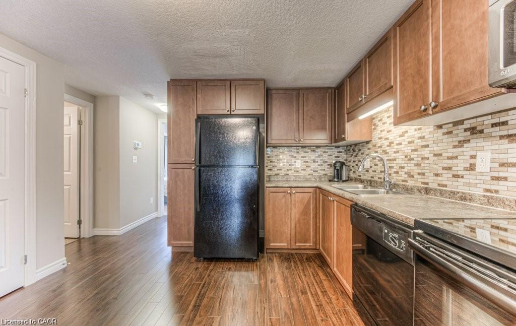 F-240 Rachel Crescent, Kitchener, ON - Indoor Photo Showing Kitchen With Double Sink