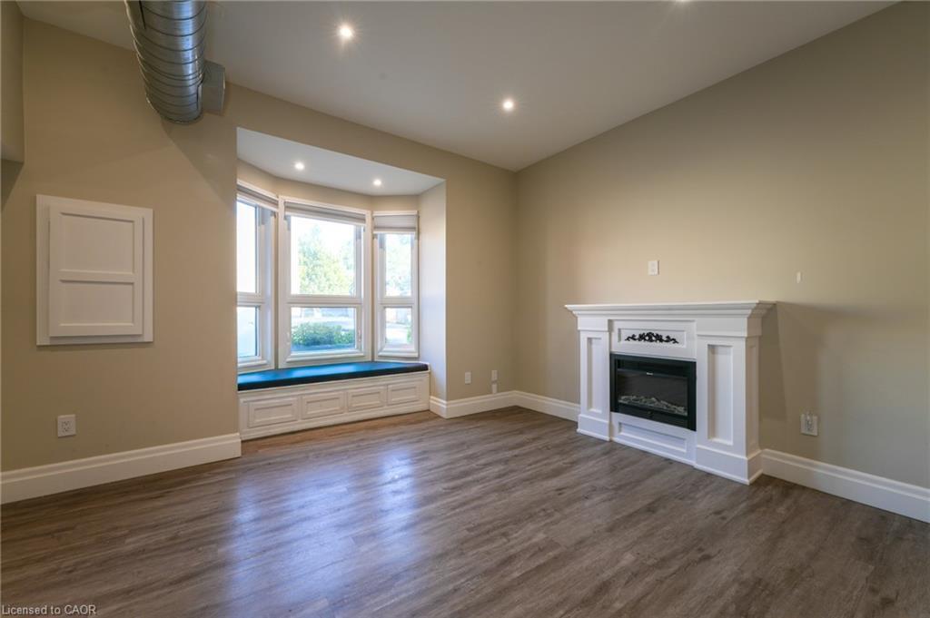 1-145 Wellington Street N, Hamilton, ON - Indoor Photo Showing Living Room With Fireplace
