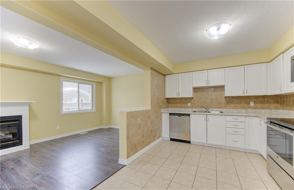 40 Red Clover Crescent, Kitchener, ON - Indoor Photo Showing Kitchen With Fireplace With Double Sink