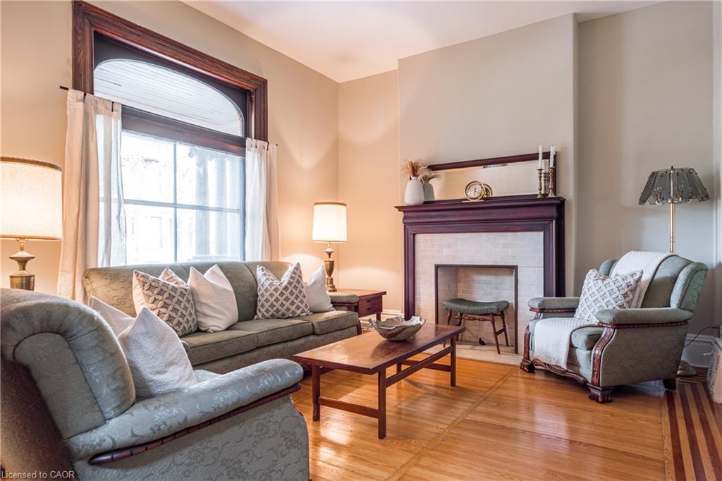 219 Charlton Avenue W, Hamilton, ON - Indoor Photo Showing Living Room With Fireplace