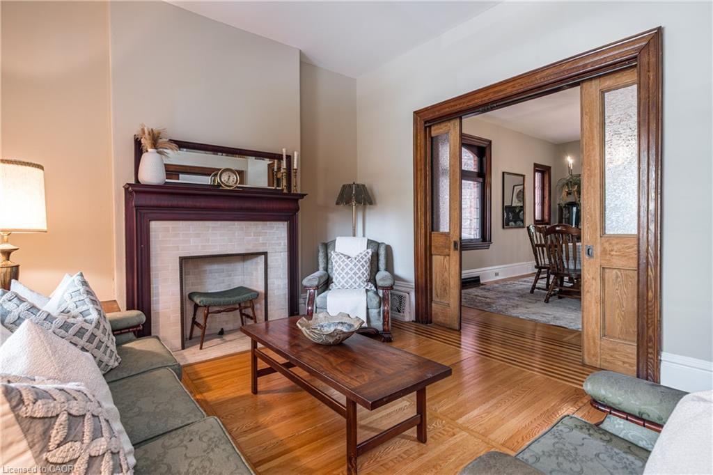 219 Charlton Avenue W, Hamilton, ON - Indoor Photo Showing Living Room With Fireplace