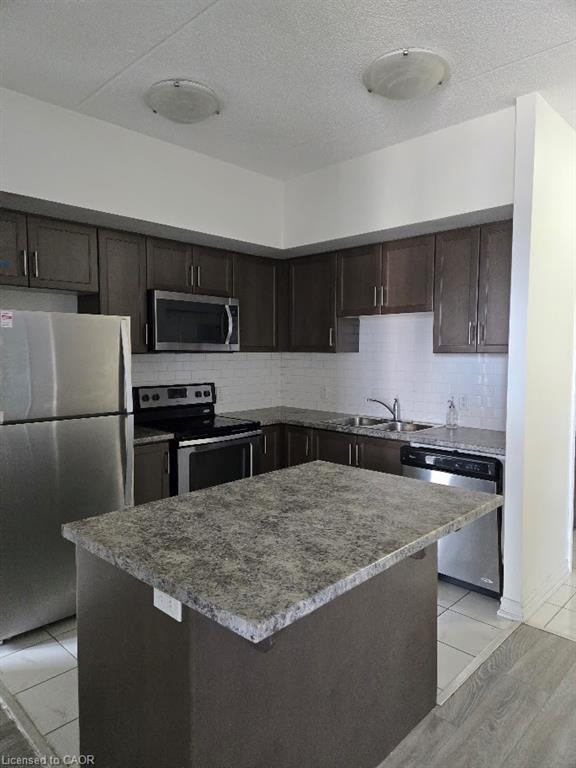 404-650 Sauve Street, Milton, ON - Indoor Photo Showing Kitchen With Upgraded Kitchen