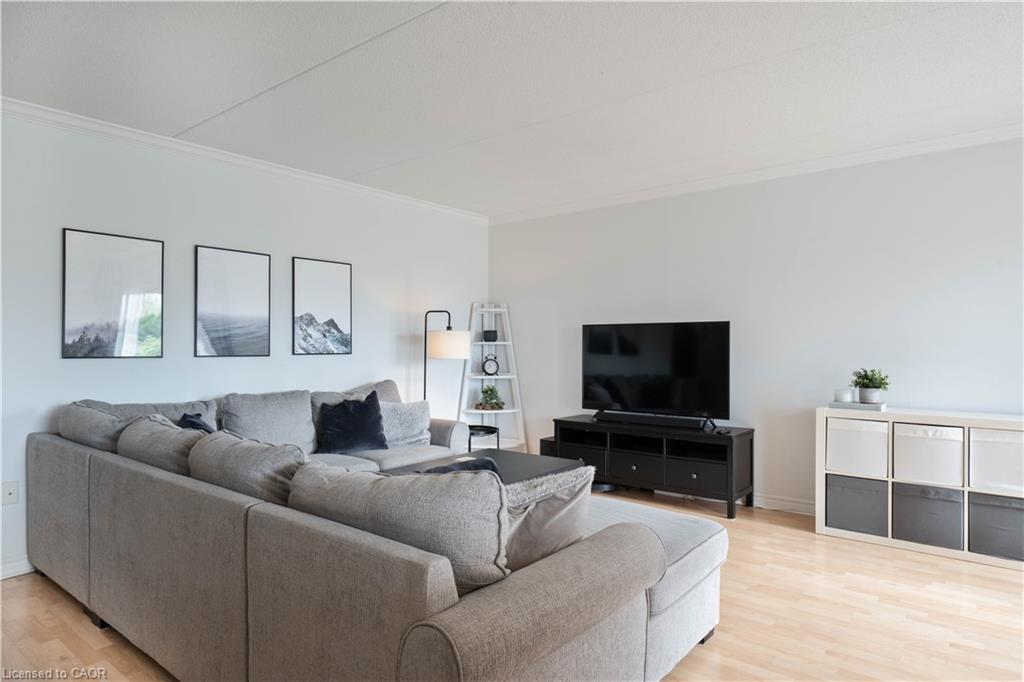 304-4450 Fairview Street, Burlington, ON - Indoor Photo Showing Living Room