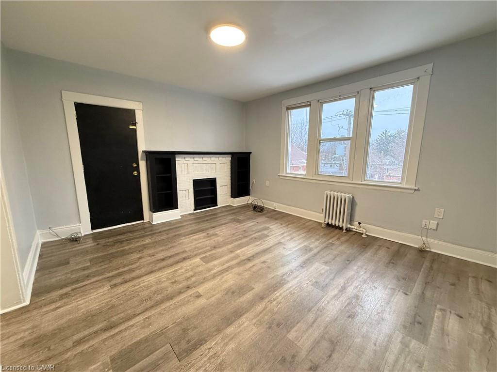 128 Carrick Avenue, Hamilton, ON - Indoor With Fireplace