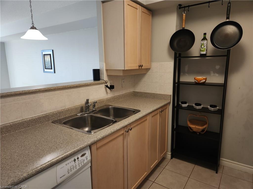 2922-700 Humberwood Boulevard, Etobicoke, ON - Indoor Photo Showing Kitchen With Double Sink