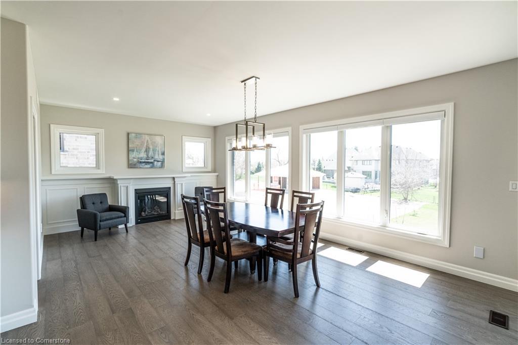 15 Hudson Drive, Brantford, ON - Indoor Photo Showing Dining Room With Fireplace