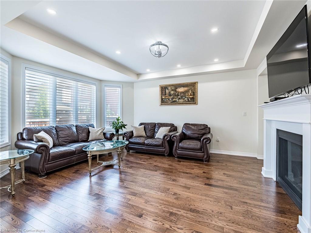 323 Harold Dent Trail, Oakville, ON - Indoor Photo Showing Living Room With Fireplace